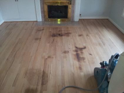 Dark spots on oak flooring