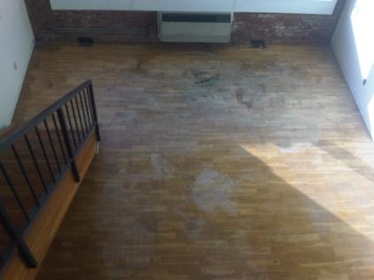 Prefinished floors with heavy damage from paint and paint thinner